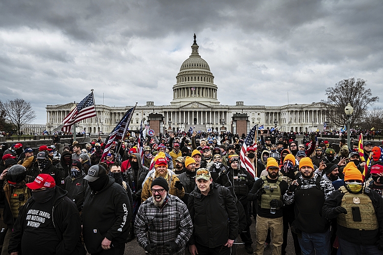 Protestors, including a group of Proud Boys, gather at the Capitol on January 6, 2021.
