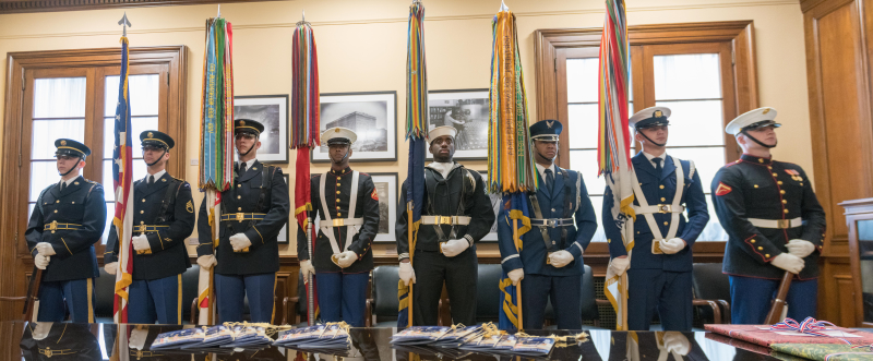 Photo of representatives from various branches of the military during a GPO Veteran's Day celebration