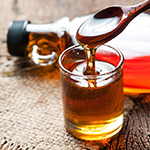 Image of maple syrup in a glass, Source: United States Department of Agriculture