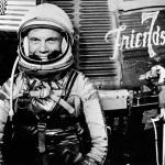 John Glenn in front of the Friendship 7 capsule