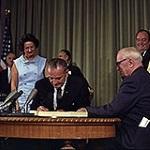 President Johnson signing the Medicare Law of 1965