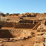 Image Looking across Pipe Shrine House at Far View House. The Far View area was once an extensive farming community and one of the most densely populated regions of the Mesa Verde., Source: National Park Service